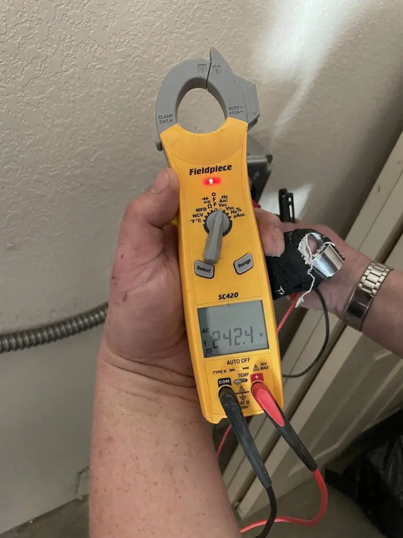 Voltage testing with clamp meter during Recessed Lighting Installation in Swarthmore